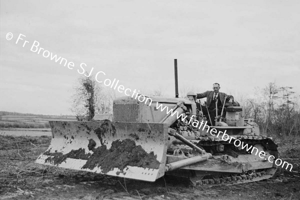 BULLDOZER  CLEARING SCRUB AND TREES